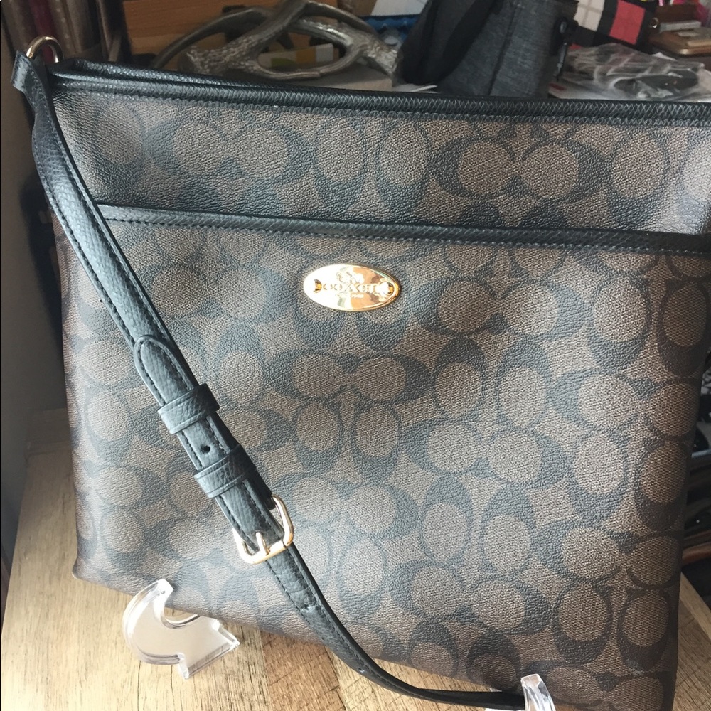 Dark brown and Black Coach Crossbody